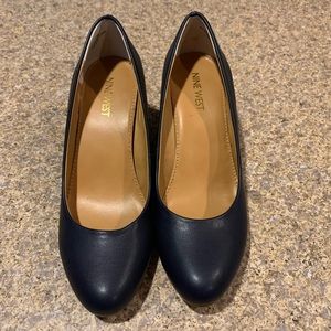Nine West navy blue wedge heels.
